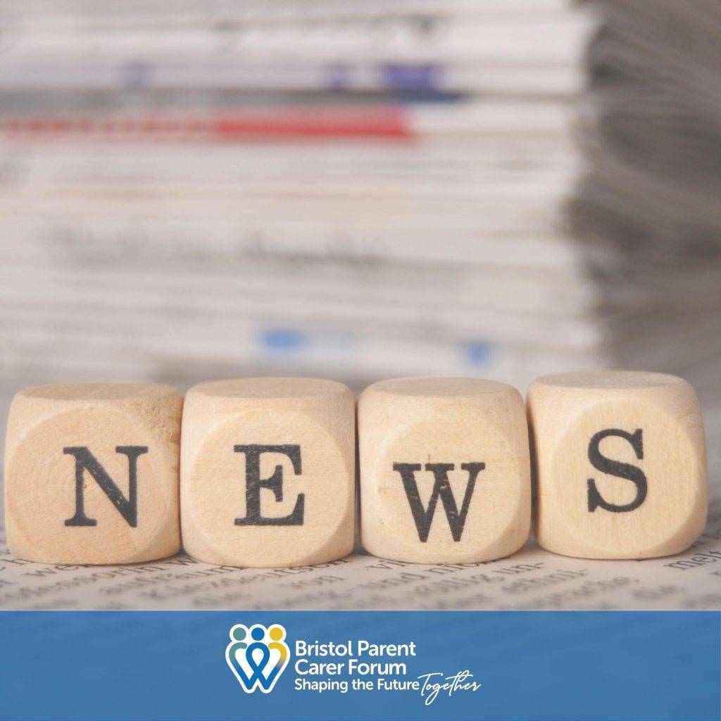 A stack of newspapers with the words NEWS spelt in front on dice