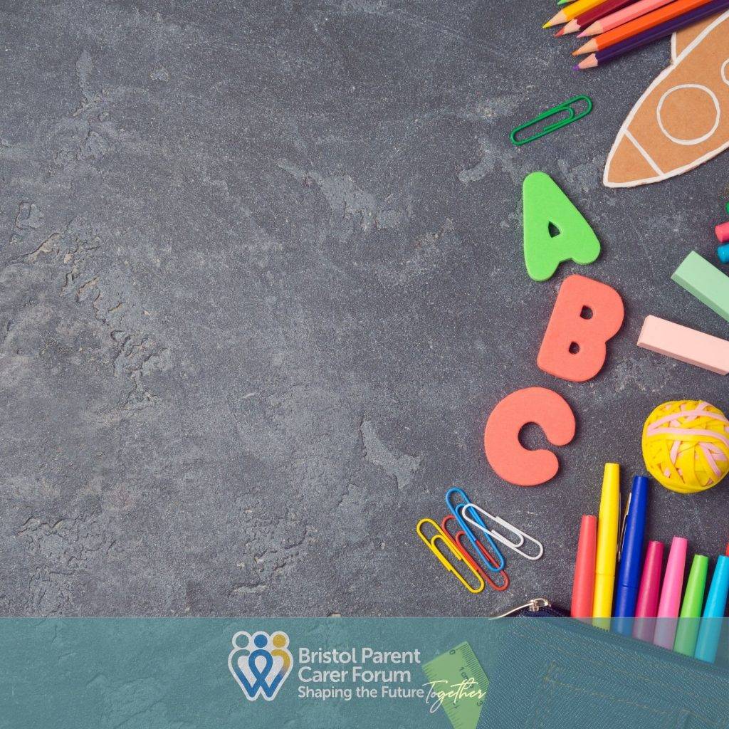 Assorted classroom supplies and alphabet letters on a chalkboard surface, representing learning and education.